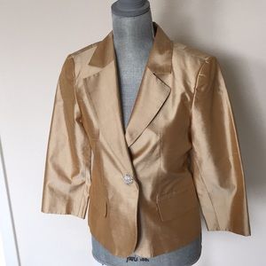 Rose Nogueira Silk golden jacket.